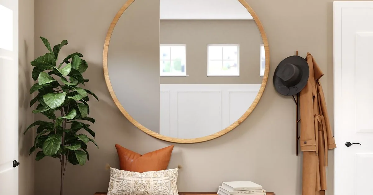 Benjamin Moore Silhouette AF-655 painted on a moody dining room wall with warm wood furniture